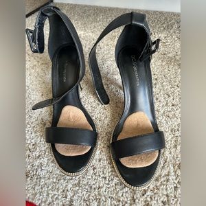 Black open till heels with gold studs